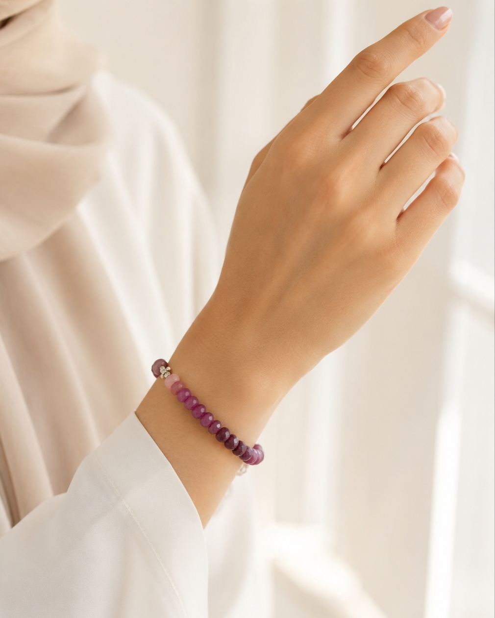 Multi-grade natural sapphire bracelet with rondelle cut stones and silver spacers
