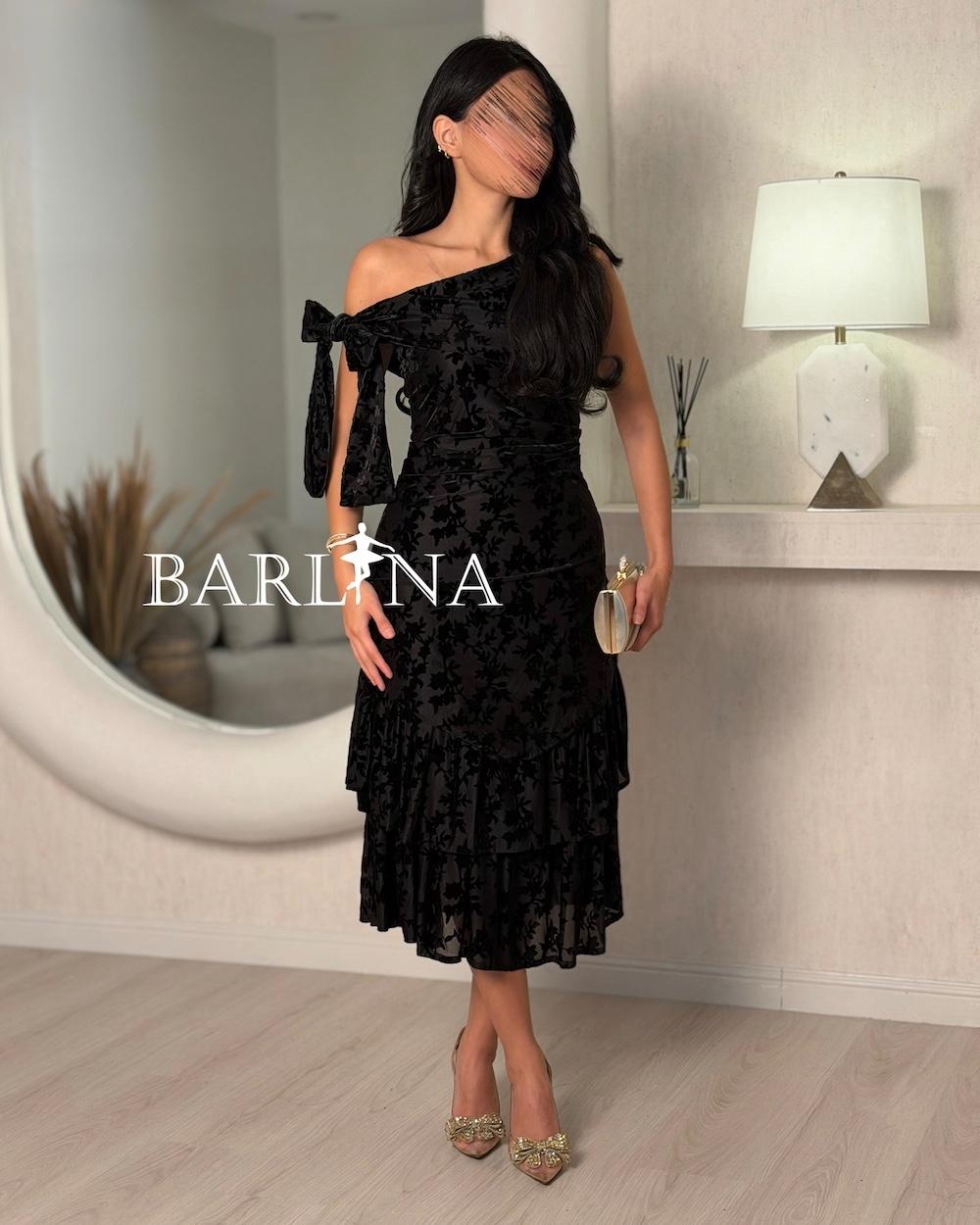 A soft midi dress with an elegant floral print