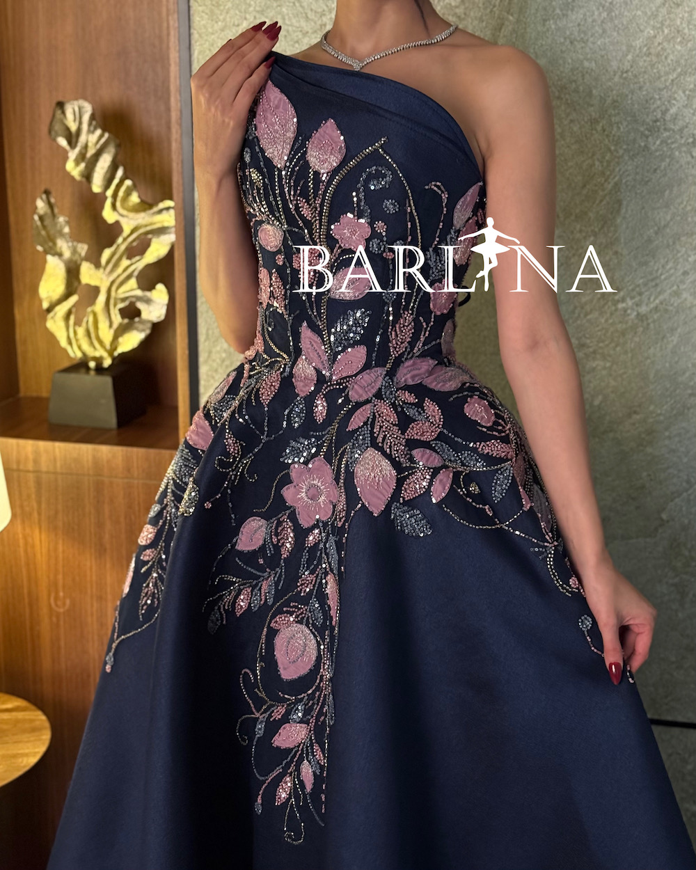 Navy blue evening dress embroidered with pink flowers