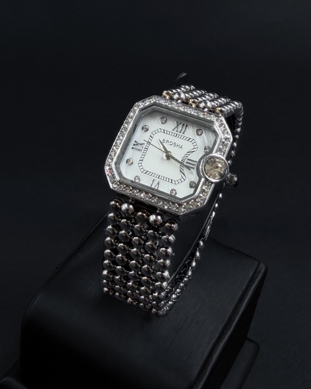 Women's watch with a bezel studded with sparkling beads