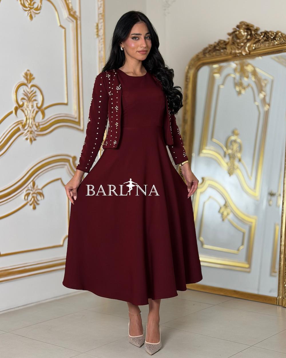Elegant dress with a crystal-embellished jacket