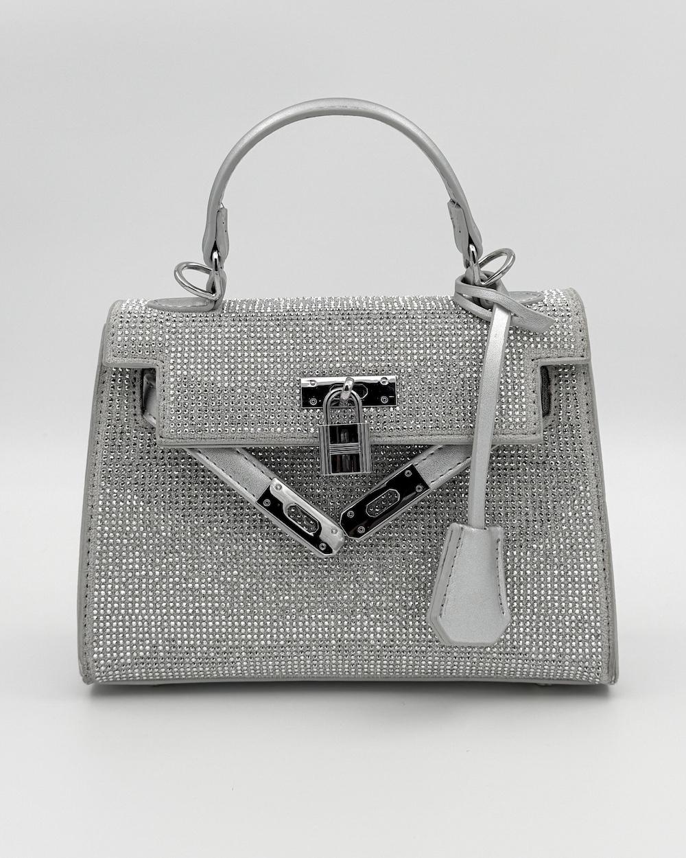 Luxury studded bag with front closure
