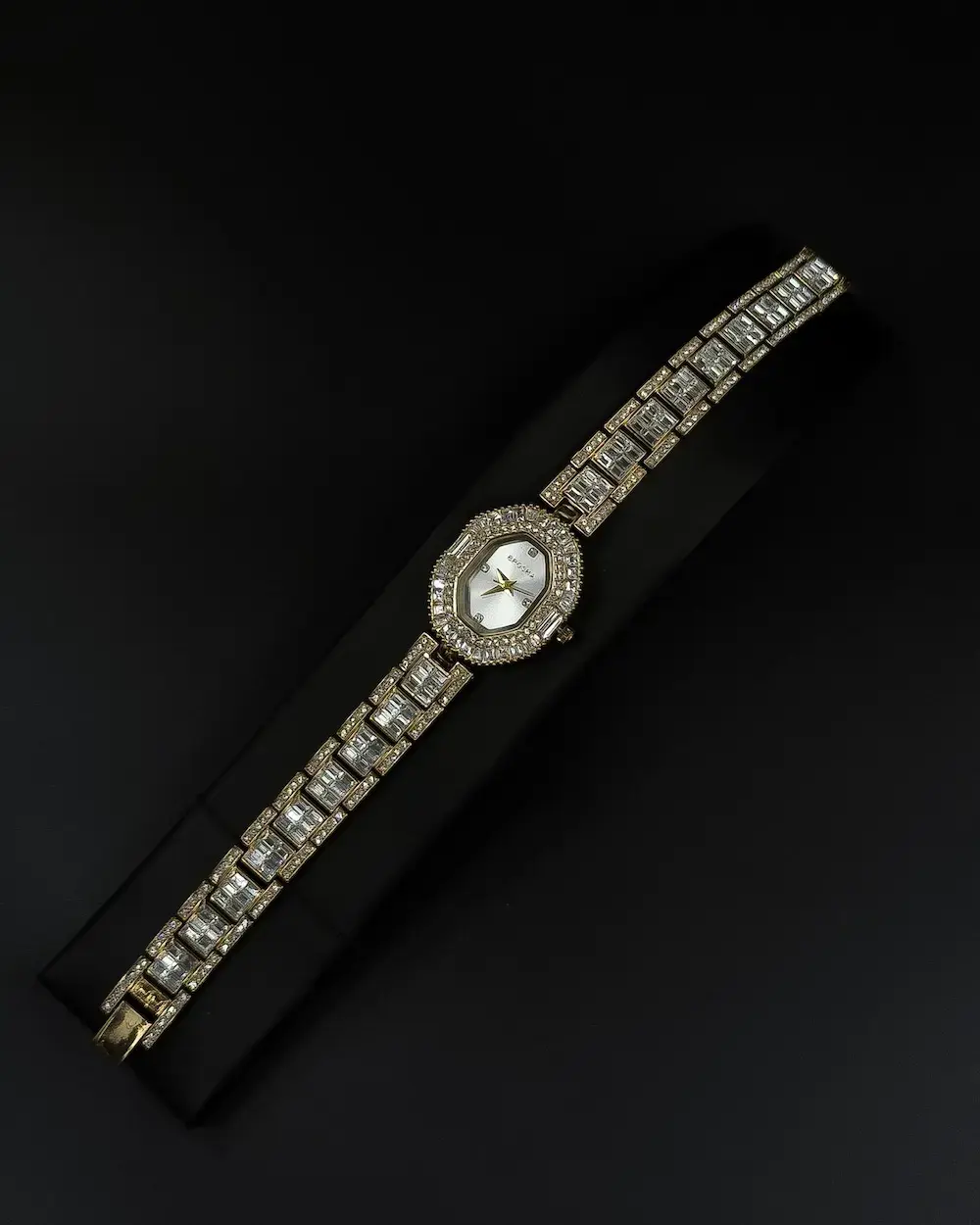 Women's evening watch with a sparkling crystal bezel