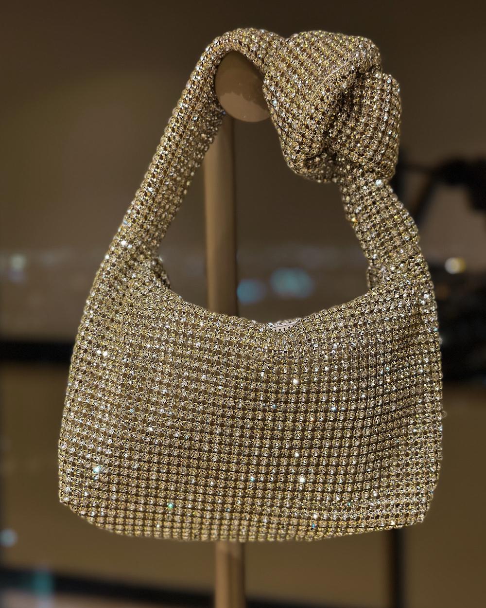 Crystal top handle bag with knot