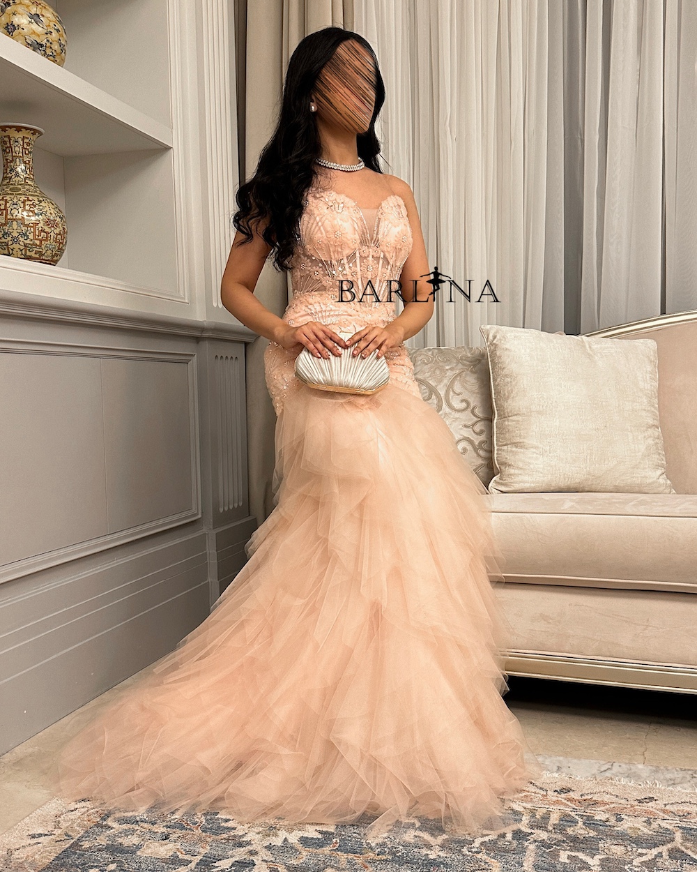 Nude dress with tiered tulle layers
