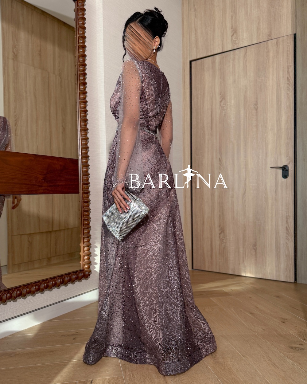 Luxurious mauve evening dress with sheer sleeves
