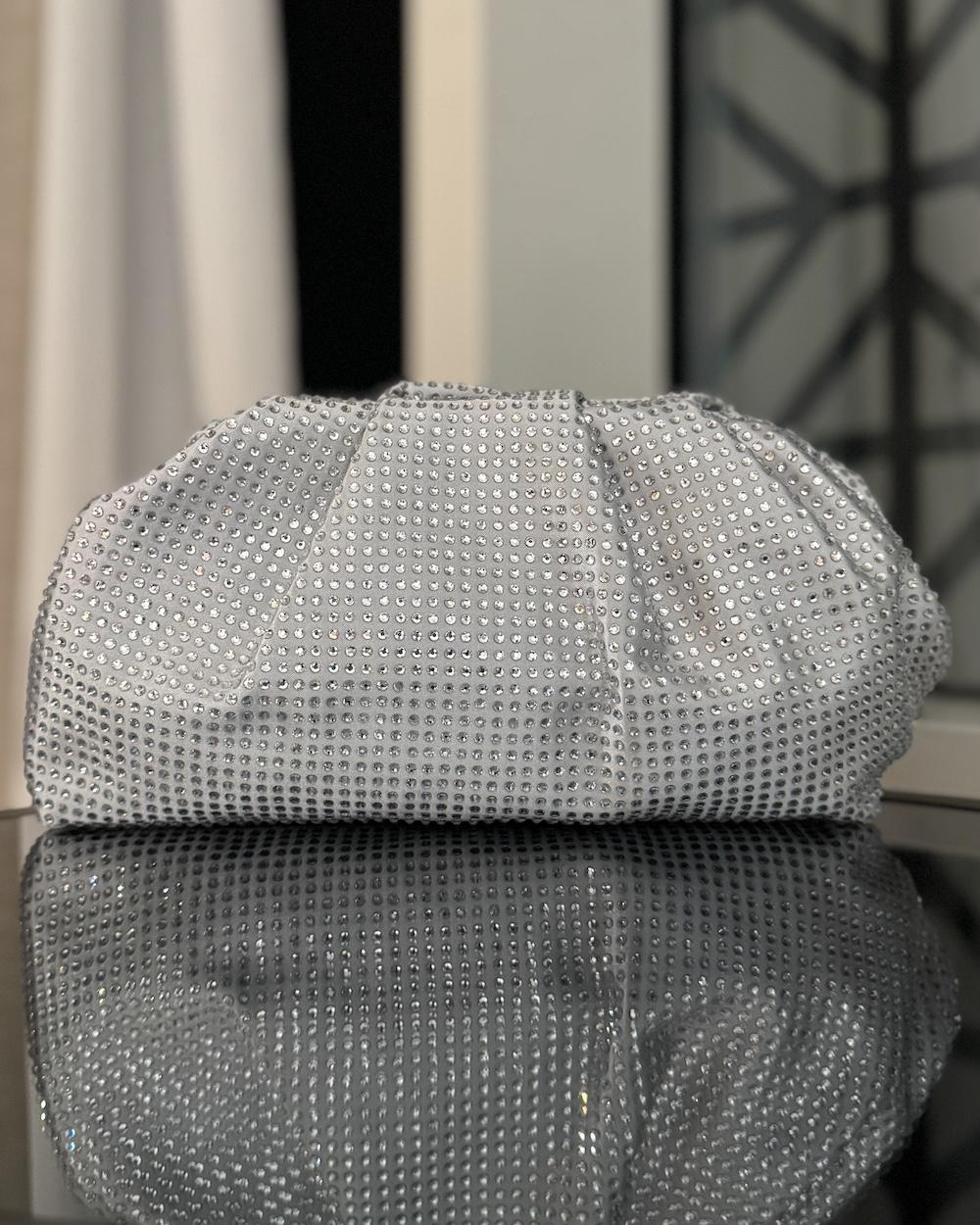 Shiny puffy clutch-style bag