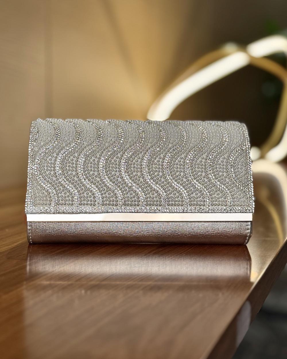 Evening bag designed with waves-shaped beads