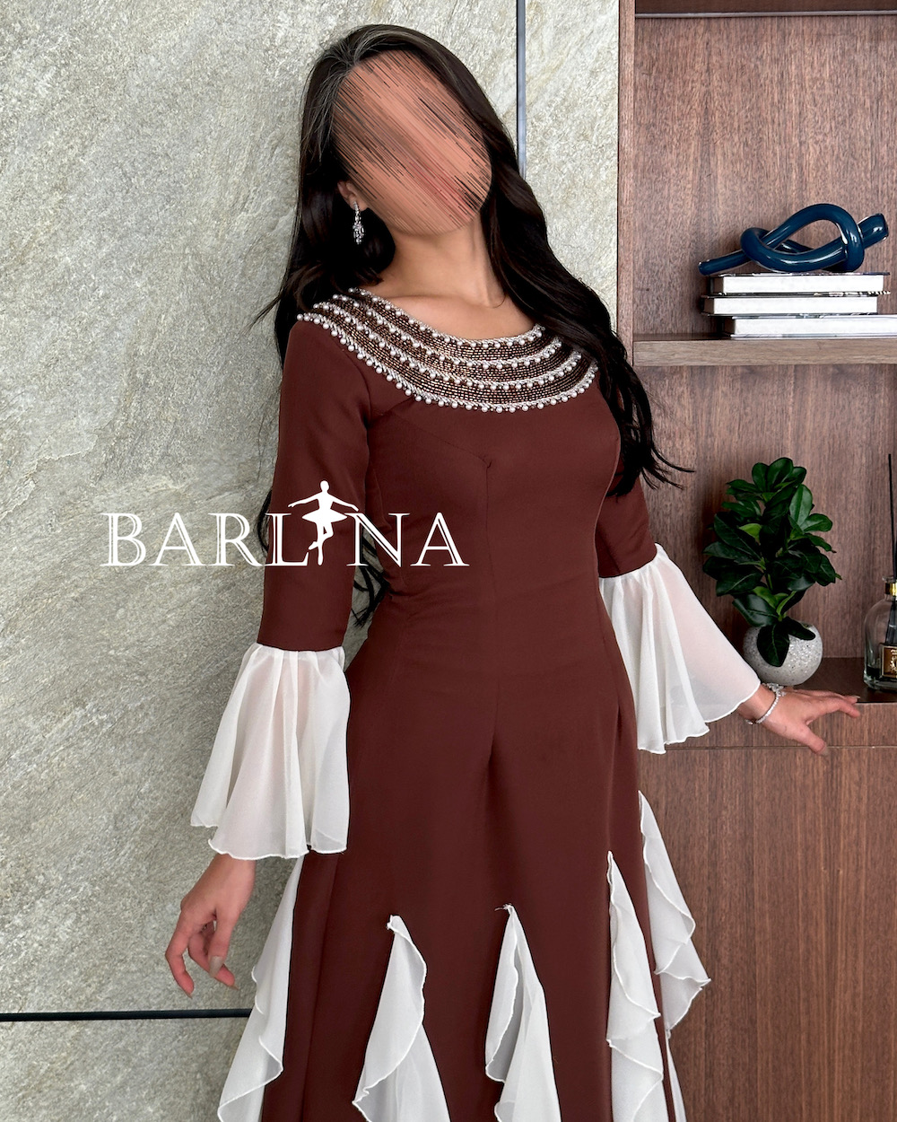 Brown dress with white details and pearl collar