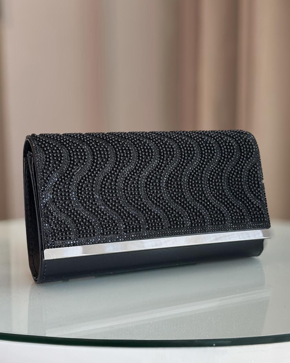 Evening bag designed with waves-shaped beads