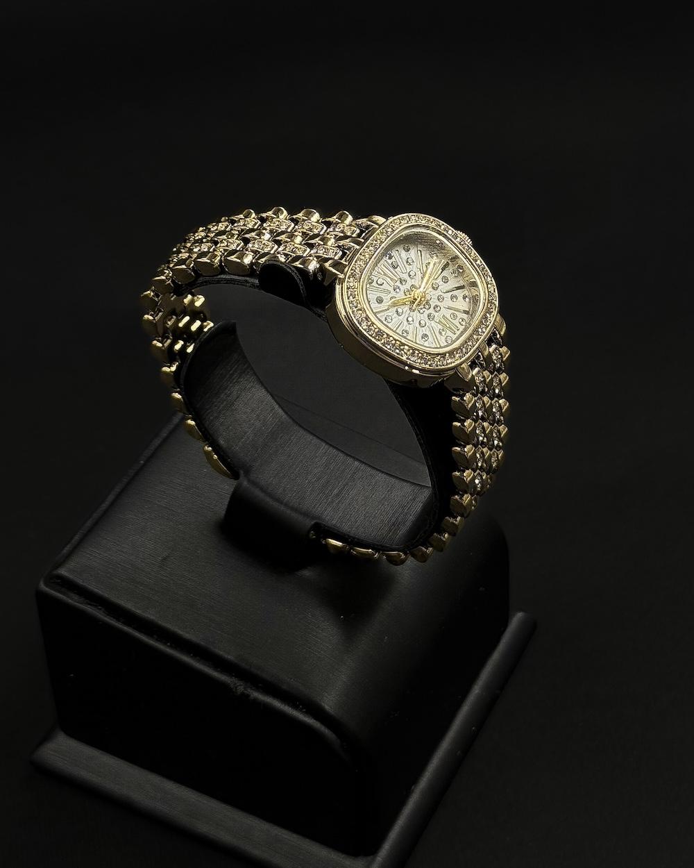 A dazzling women's watch fully studded