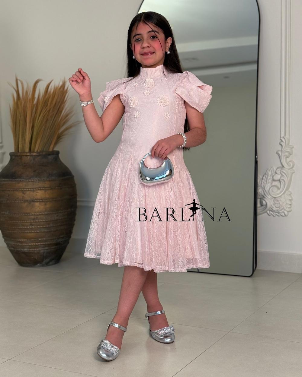 A soft girls’ lace dress with a feminine design