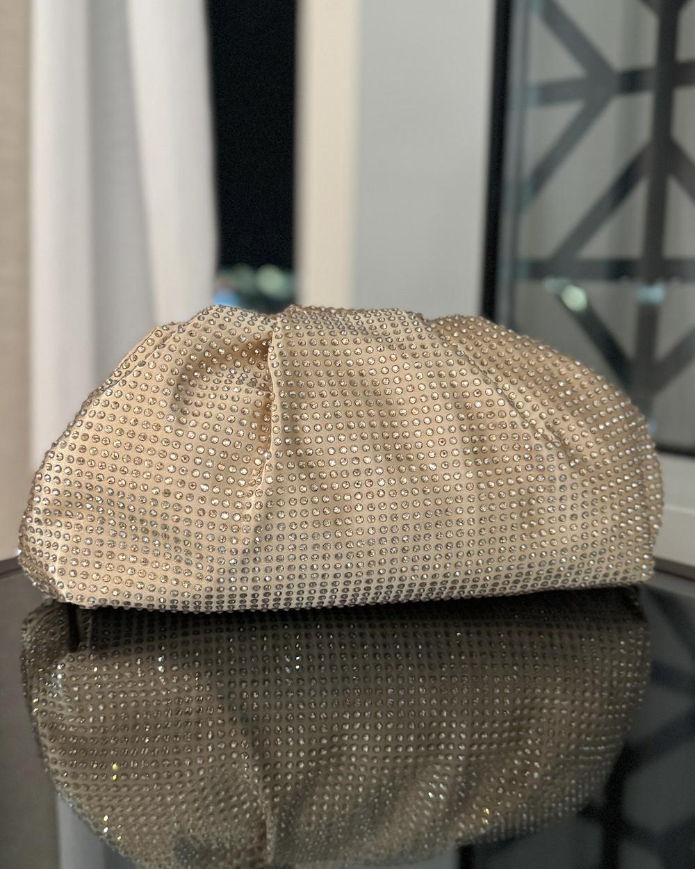 Shiny puffy clutch-style bag