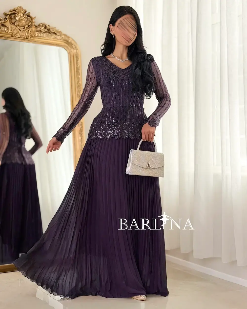 Luxurious dress with elegant sheer sleeves