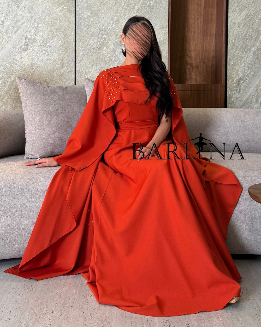 Dark orange dress with a distinctive back design