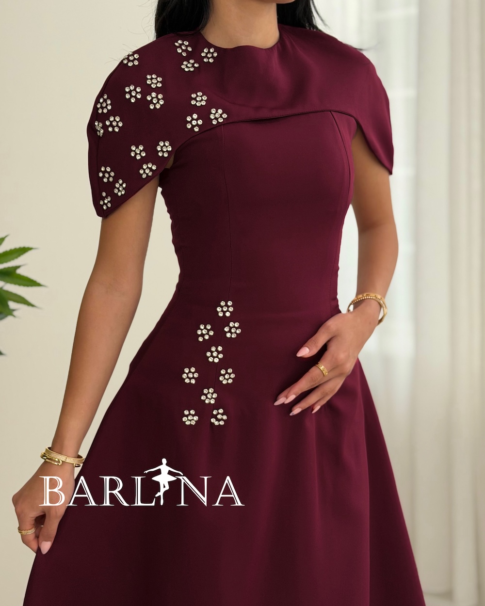 Burgundy dress with short sleeves and crystals