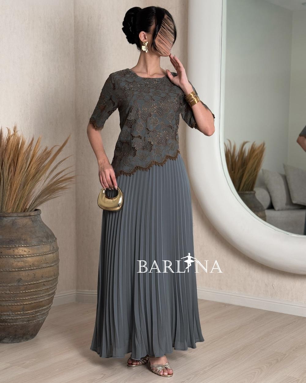 Floral pleated dress with a wavy hem