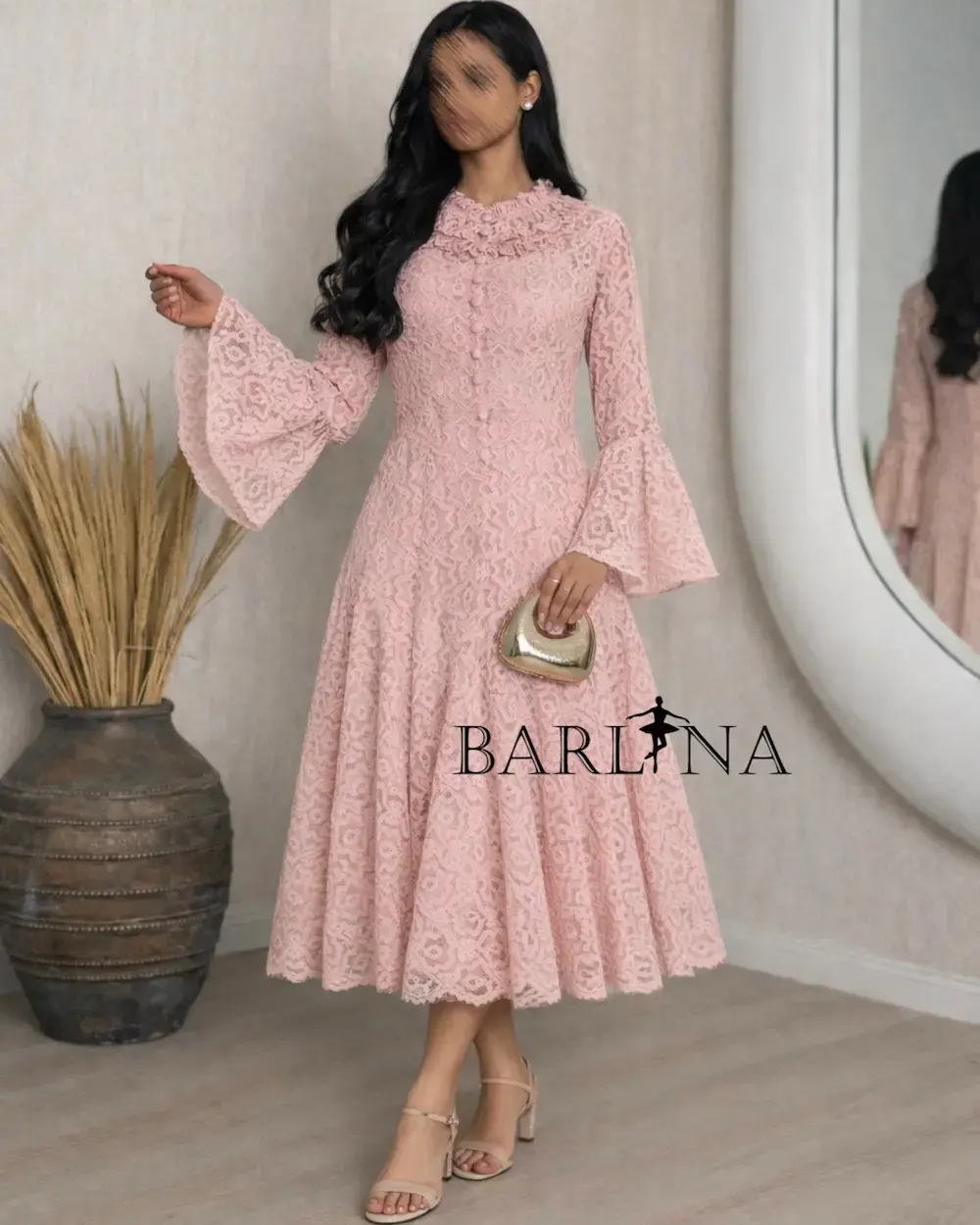 A soft dress adorned with elegant lace patterns