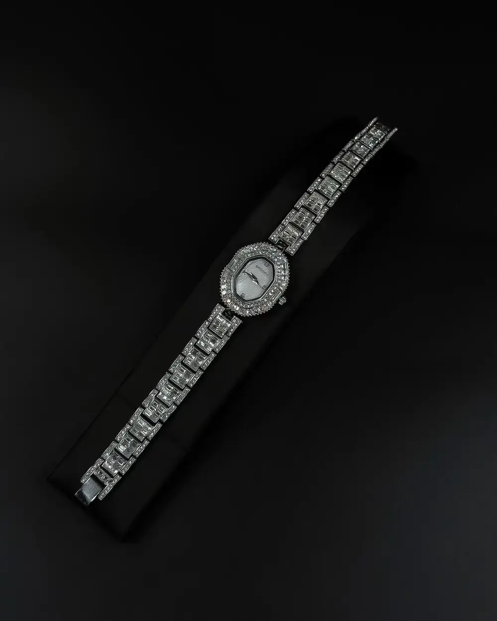 Women's evening watch with a sparkling crystal bezel