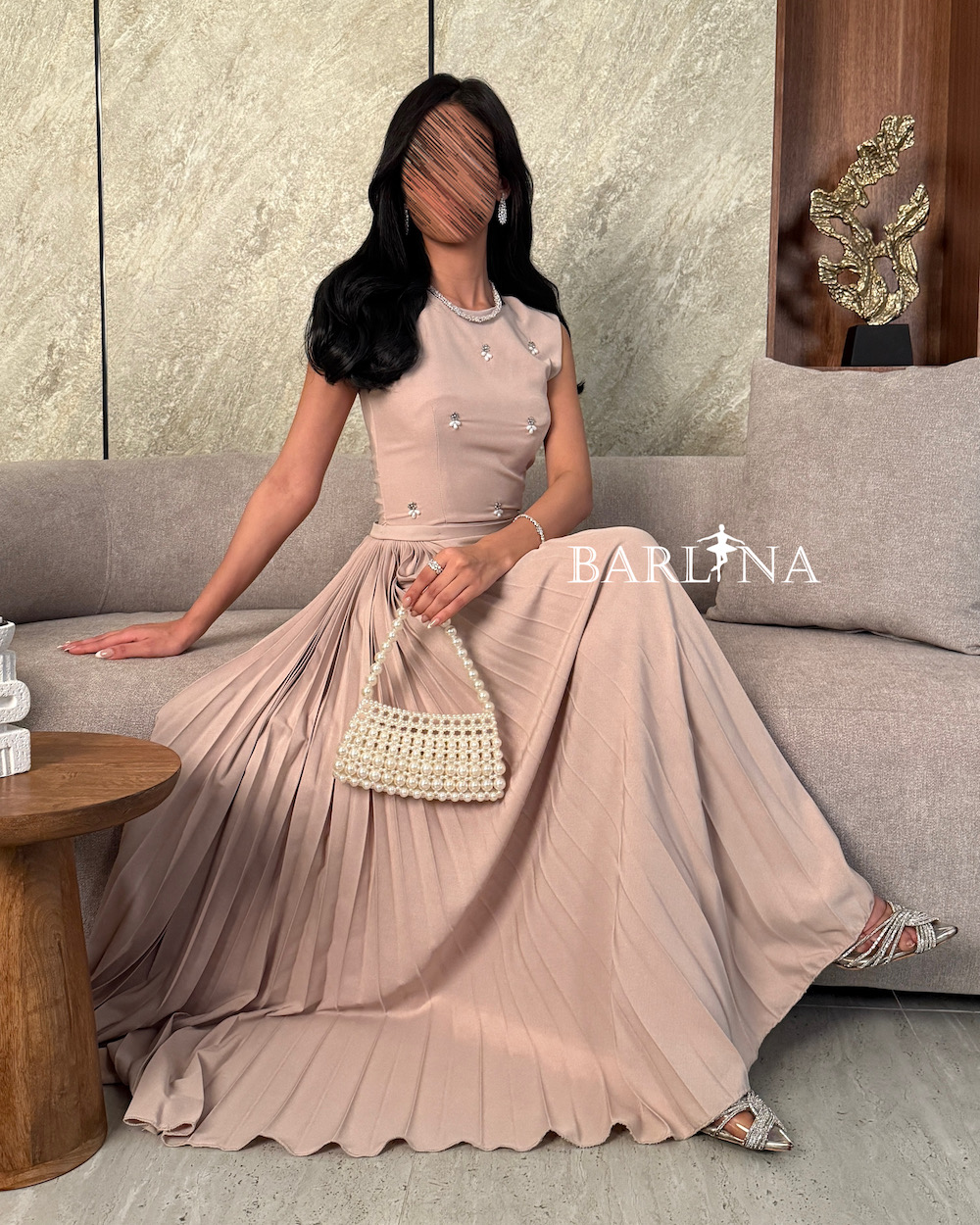 Beige pleated dress with elegant embroidery