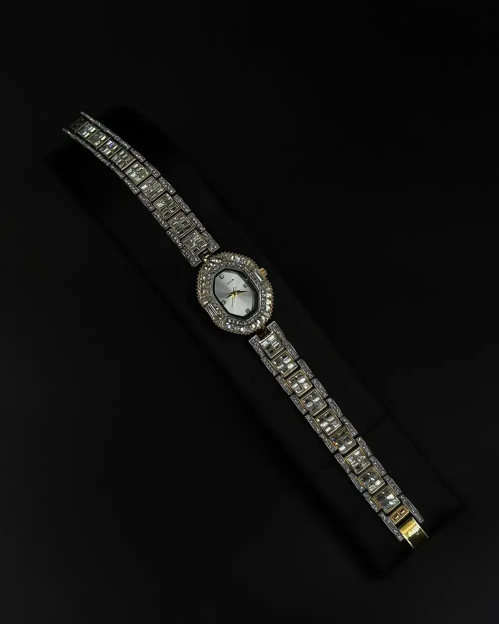 Women's evening watch with a sparkling crystal bezel