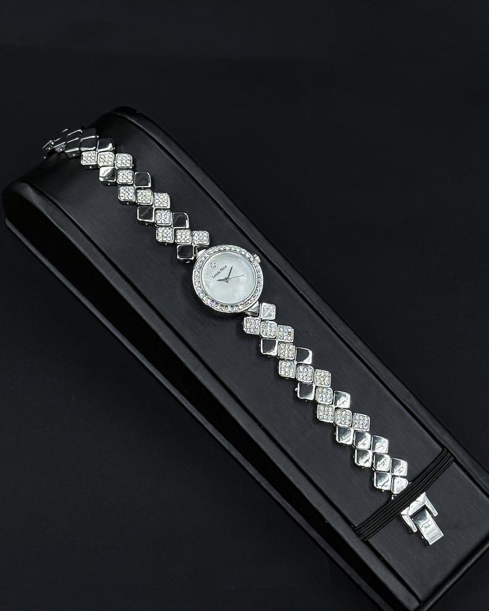 A women's watch with elegant, shimmering details.