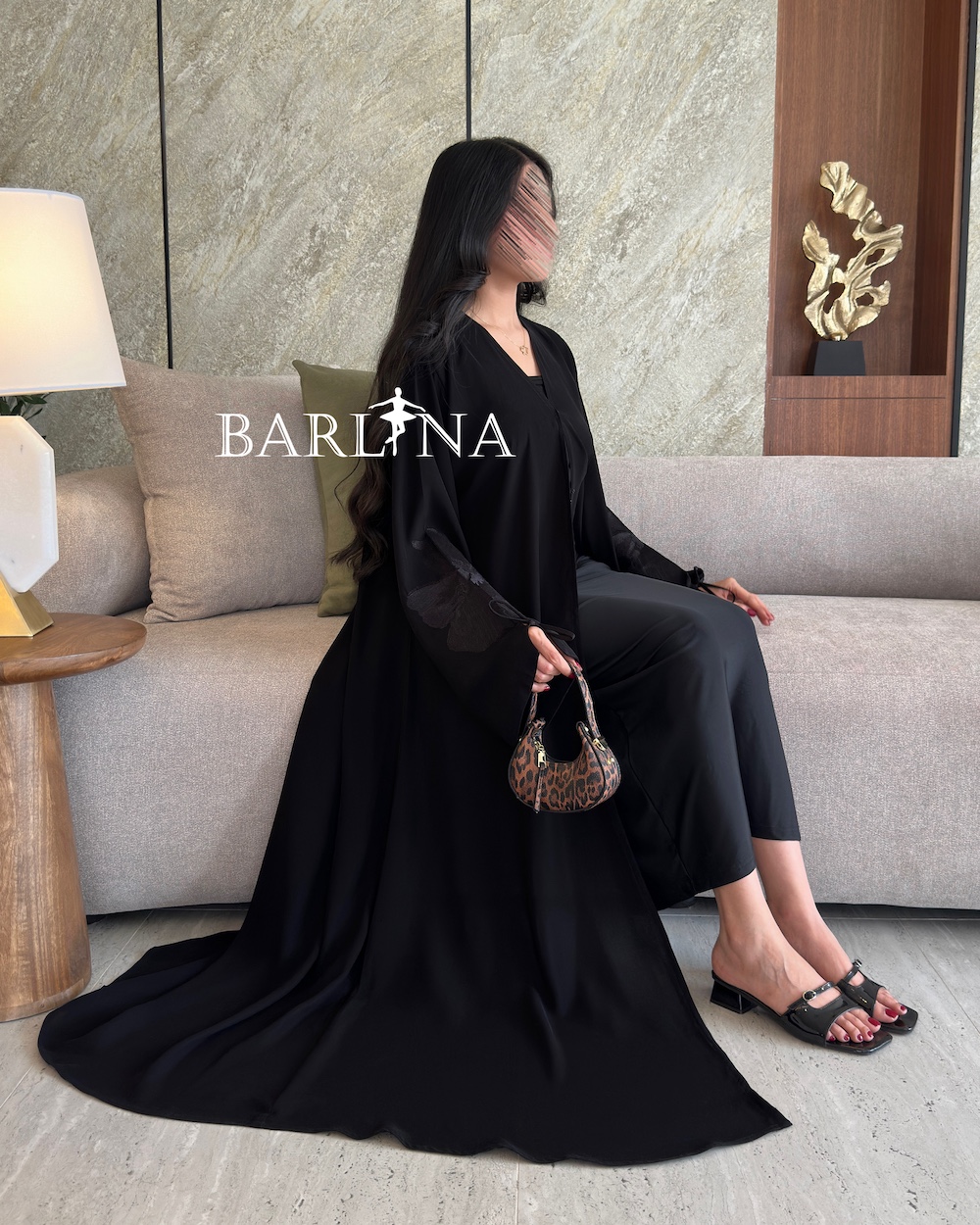 Elegant black abaya with embroidered sleeves