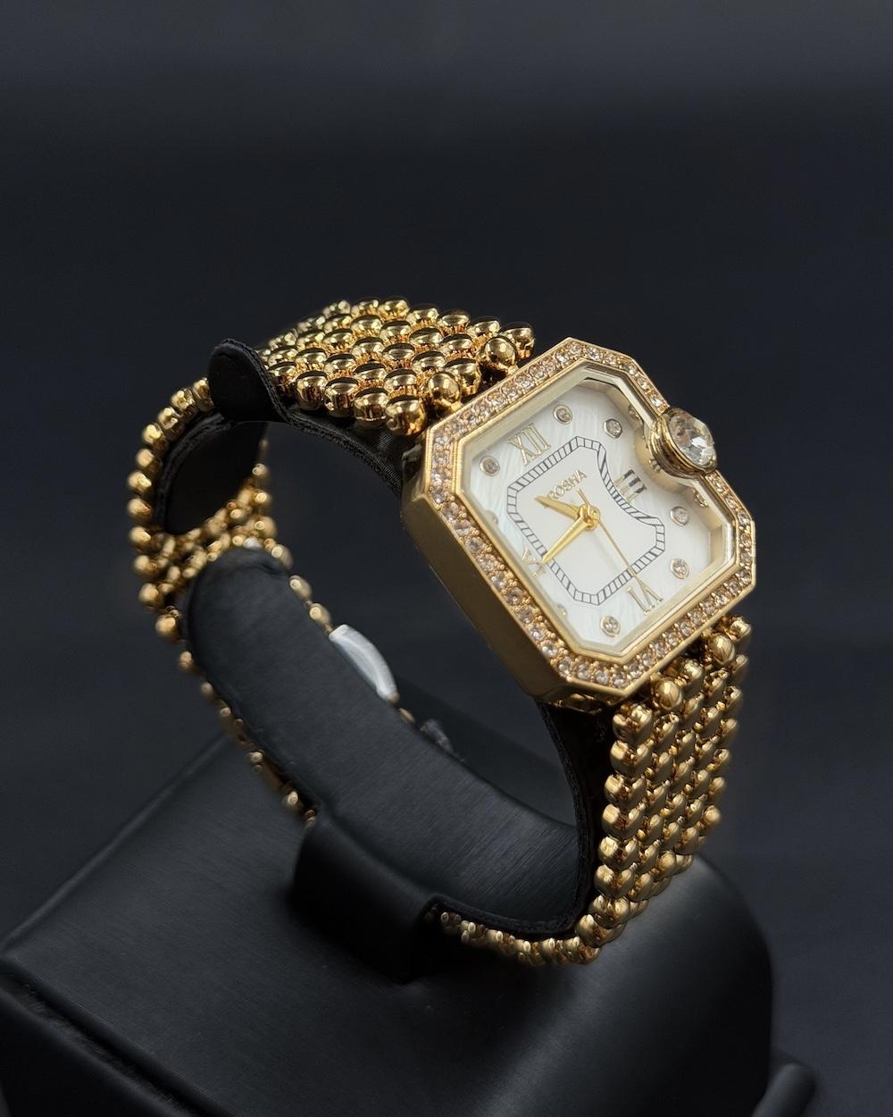 Women's watch with a bezel studded with sparkling beads