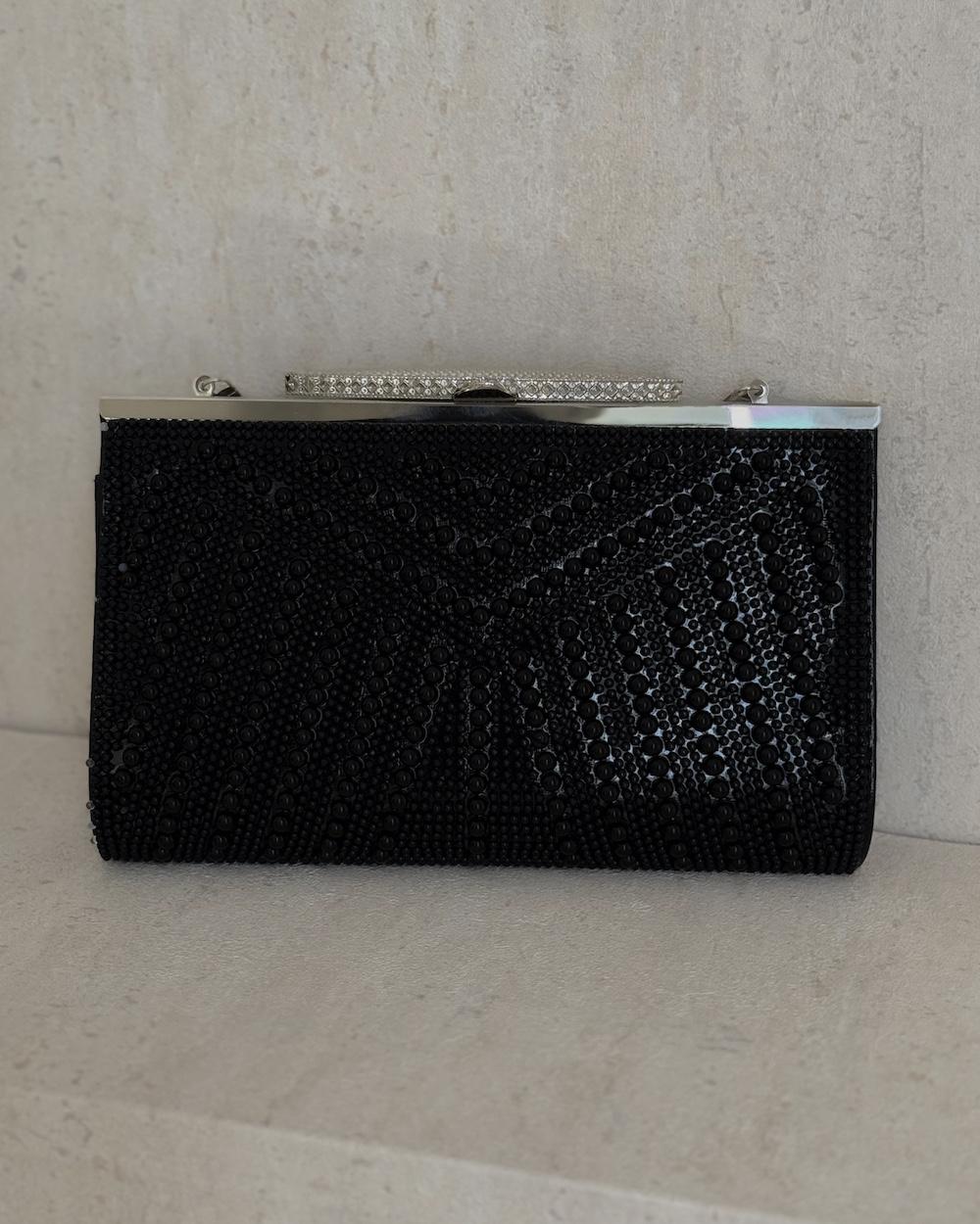 Pearl evening clutch bag with a geometric design