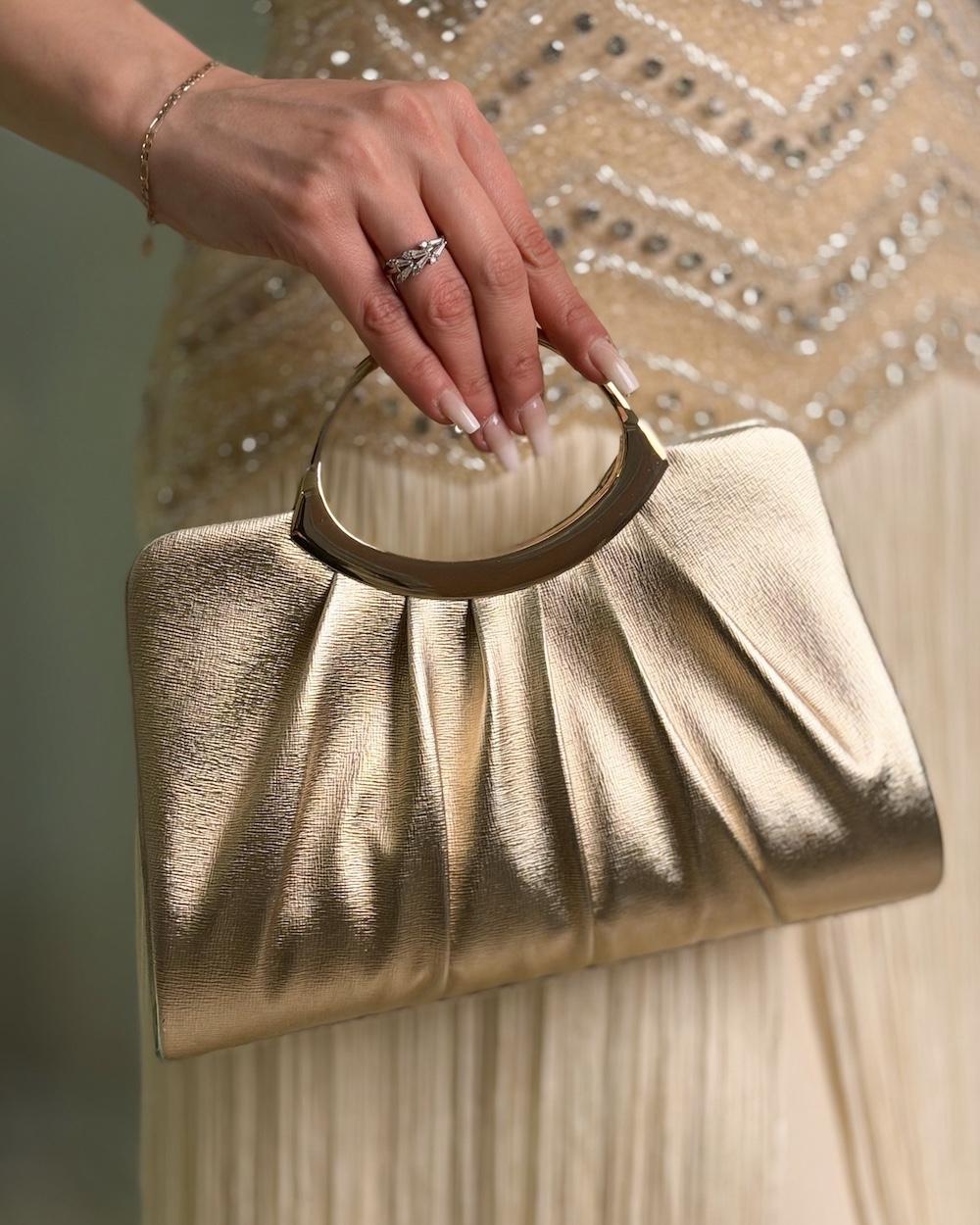 Evening bag with a soft design and elegant pleats