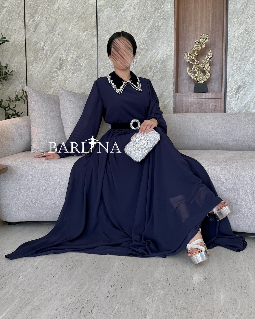 Navy blue dress with pearl embellished collar and black belt
