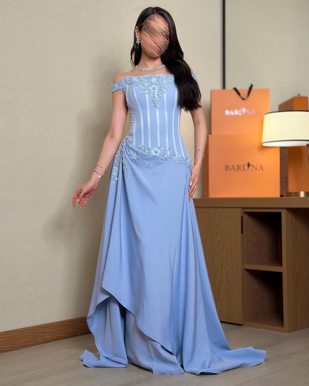 Draped evening dress with a fitted corset silhouette