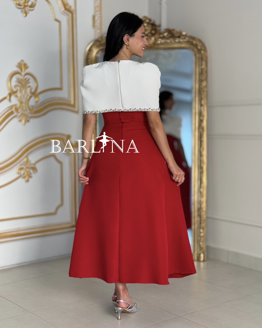 Red dress with a separate white cape