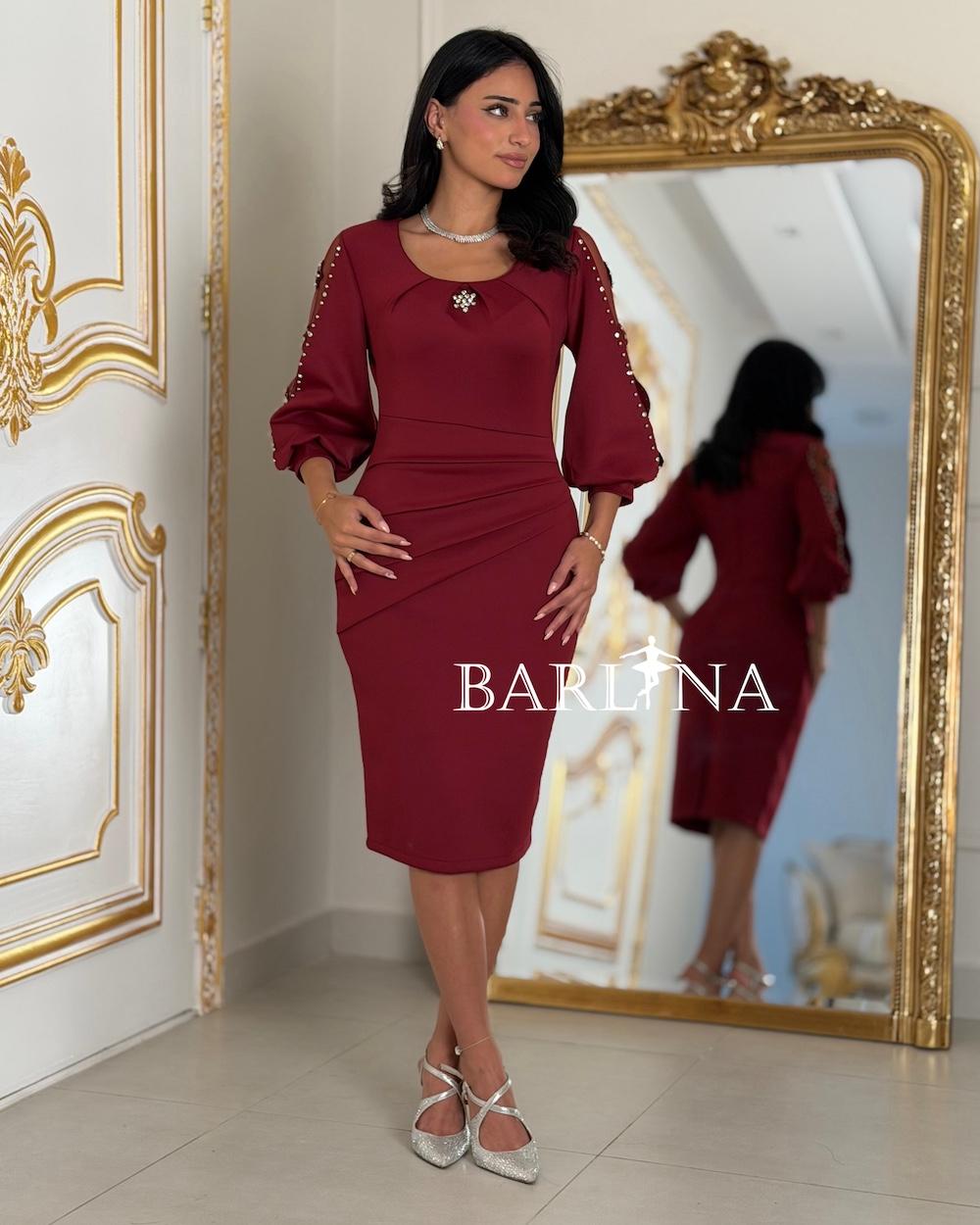 Short dress with pleats and sheer sleeves