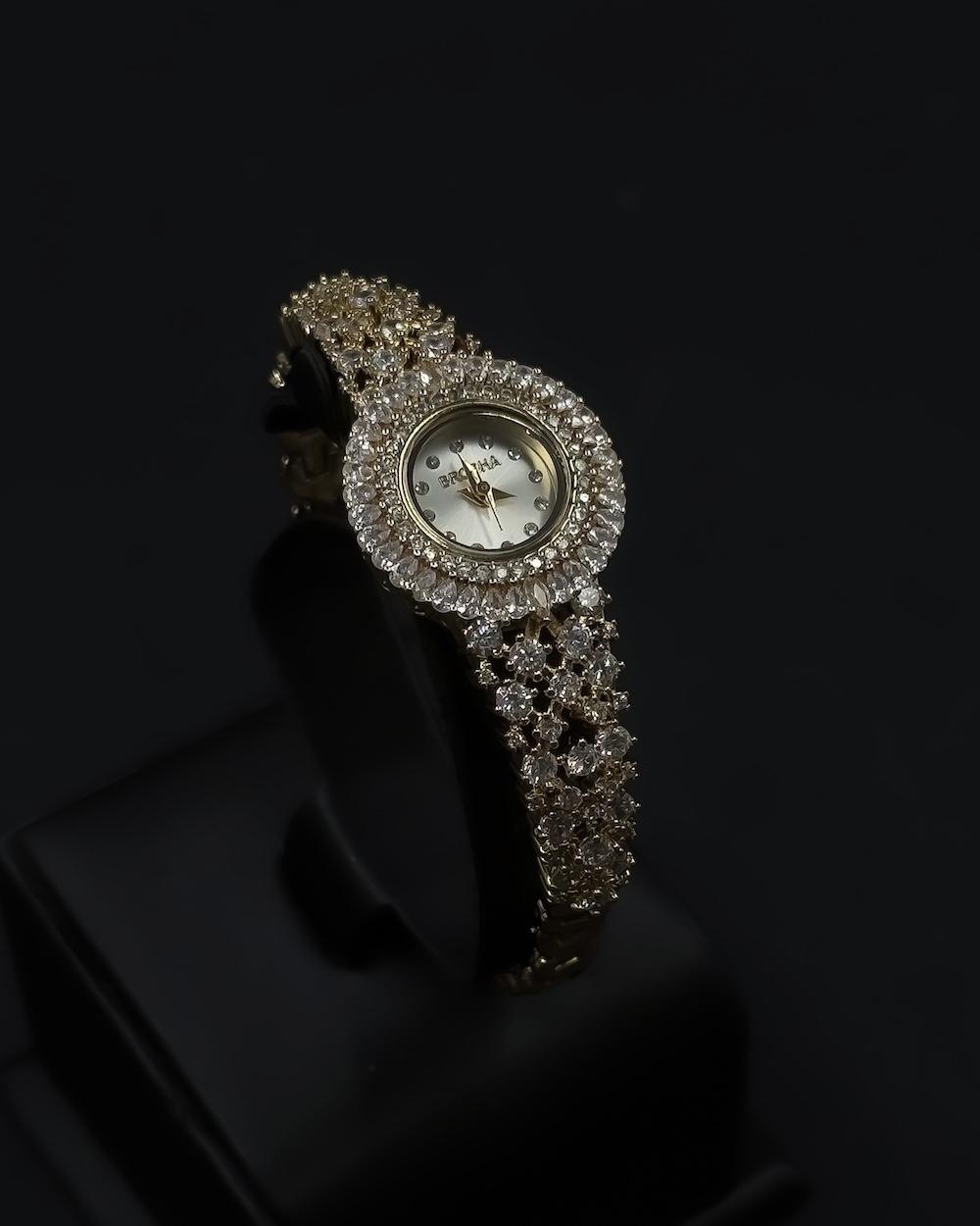 Women's watch with a round design and crystal embellishments