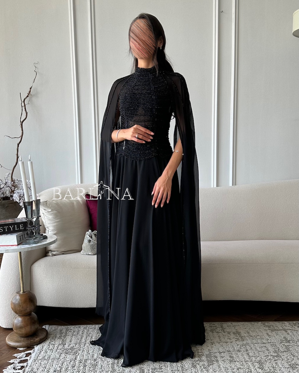 Royal black dress with lobes and cape sleeves