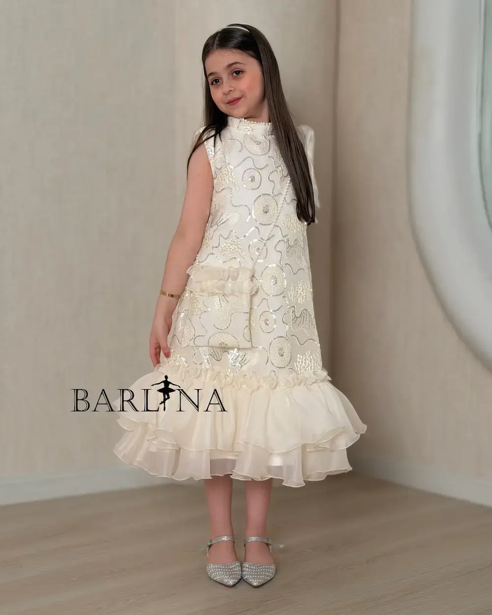 Girls' embroidered dress with ruffles at the bottom