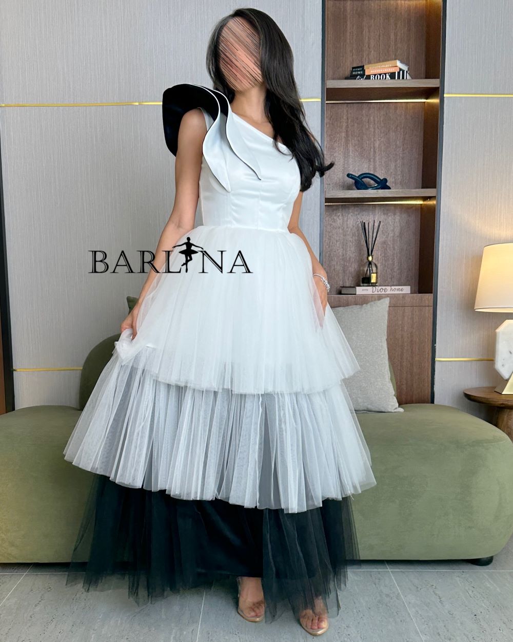 Elegant women's dress with layers of black and white tulle