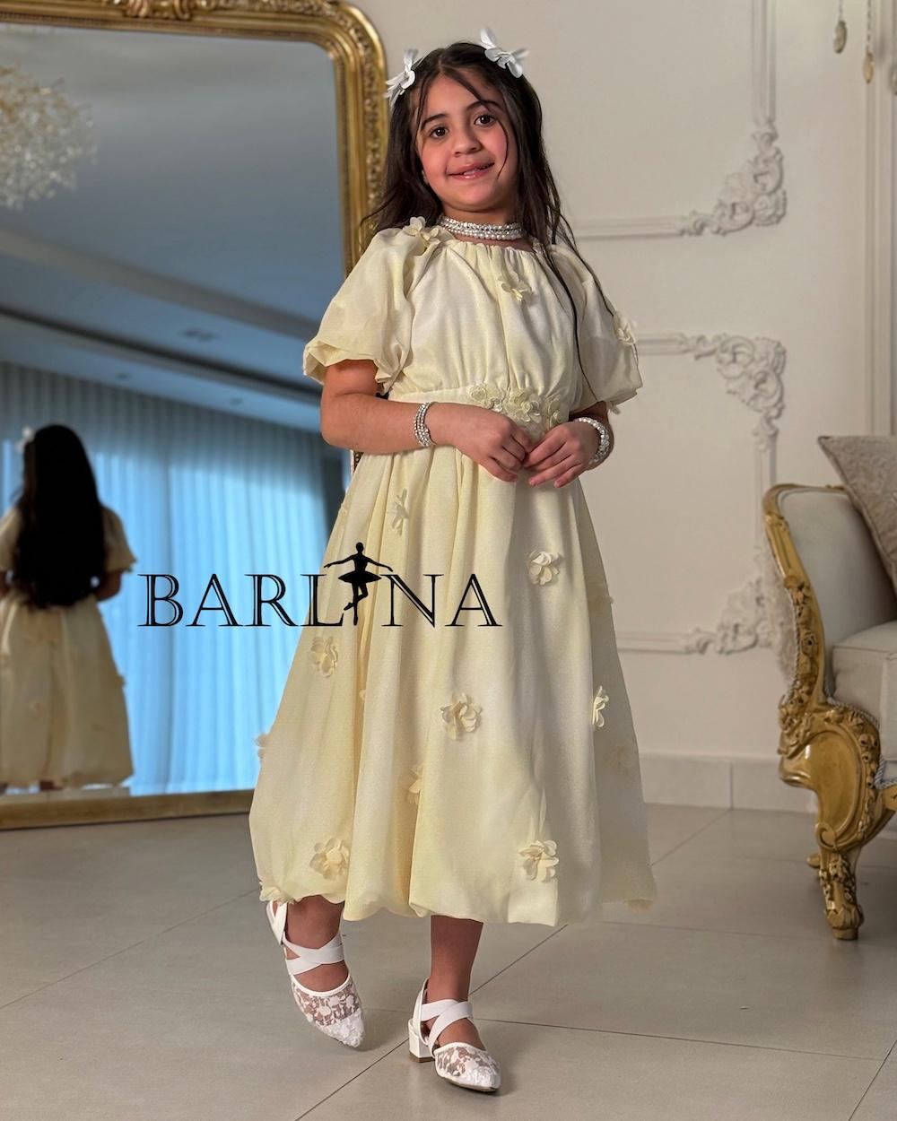 Girls' dress with a belt decorated with flowers