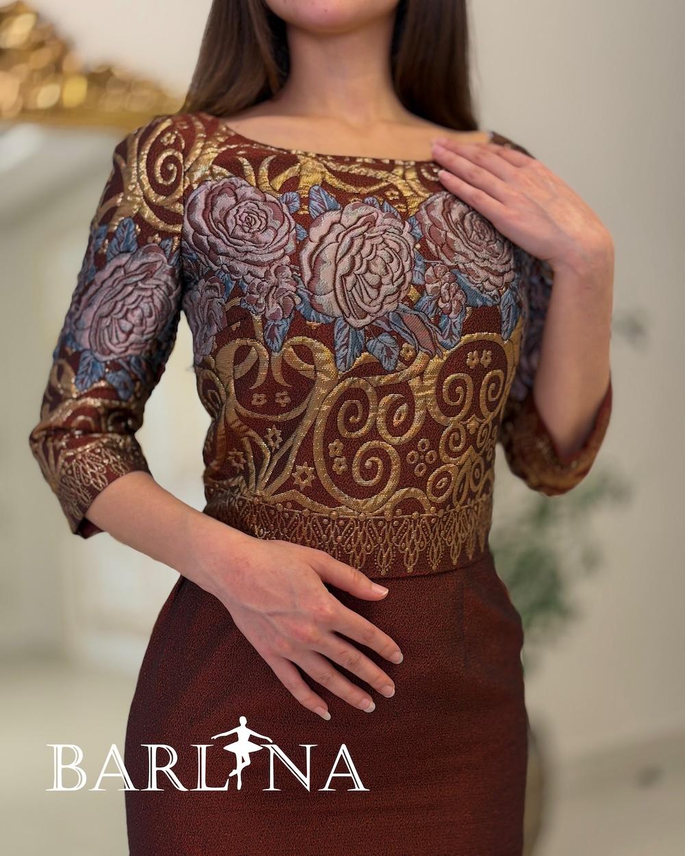 Black midi dress with a gold embroidered overlay