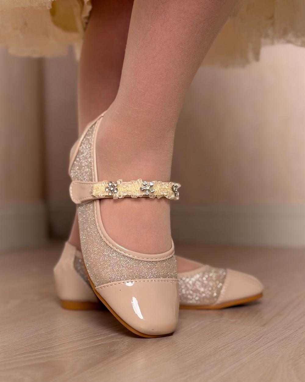 Stylish girls' shoes with a shiny design