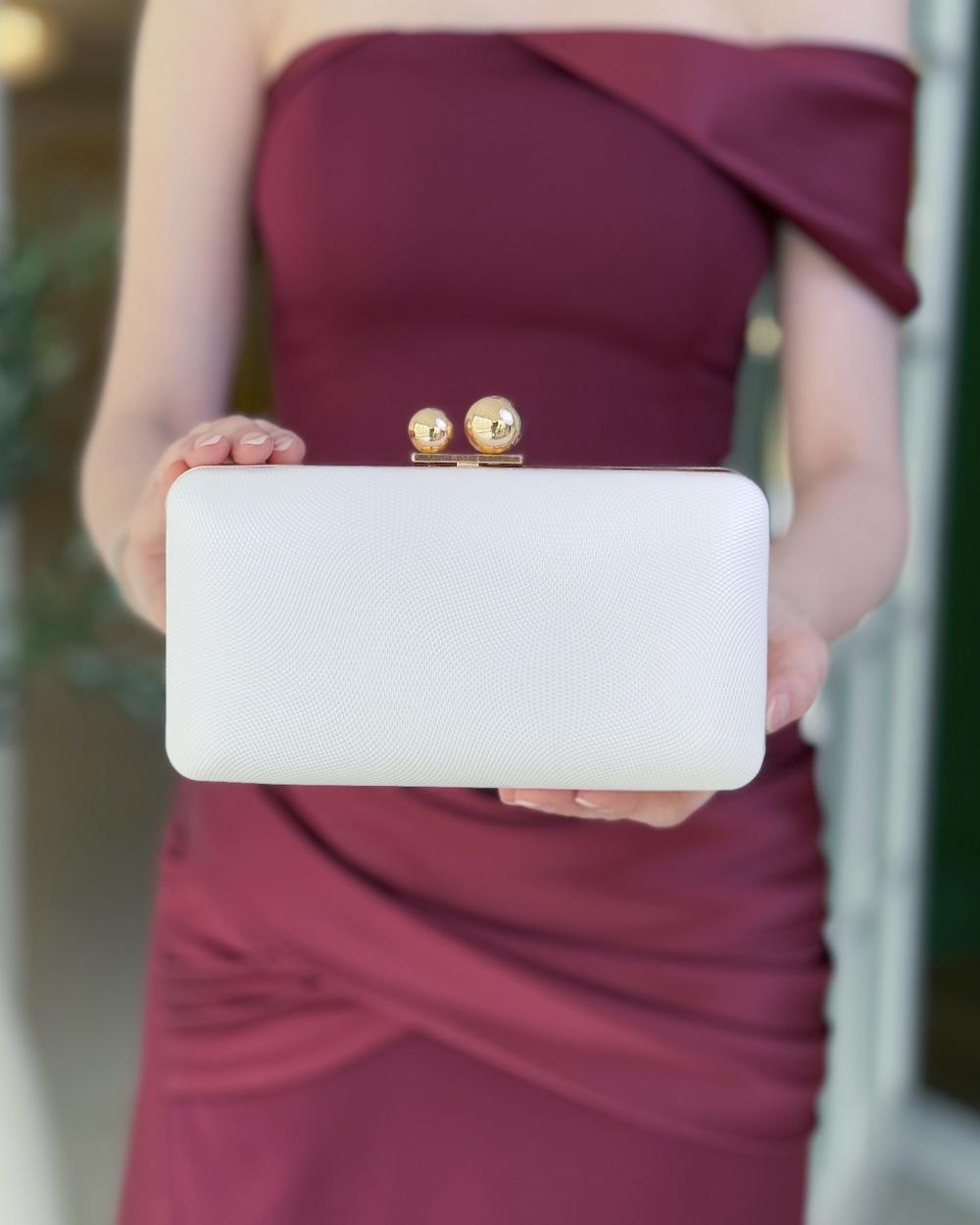 Elegant black clutch bag with a soft texture