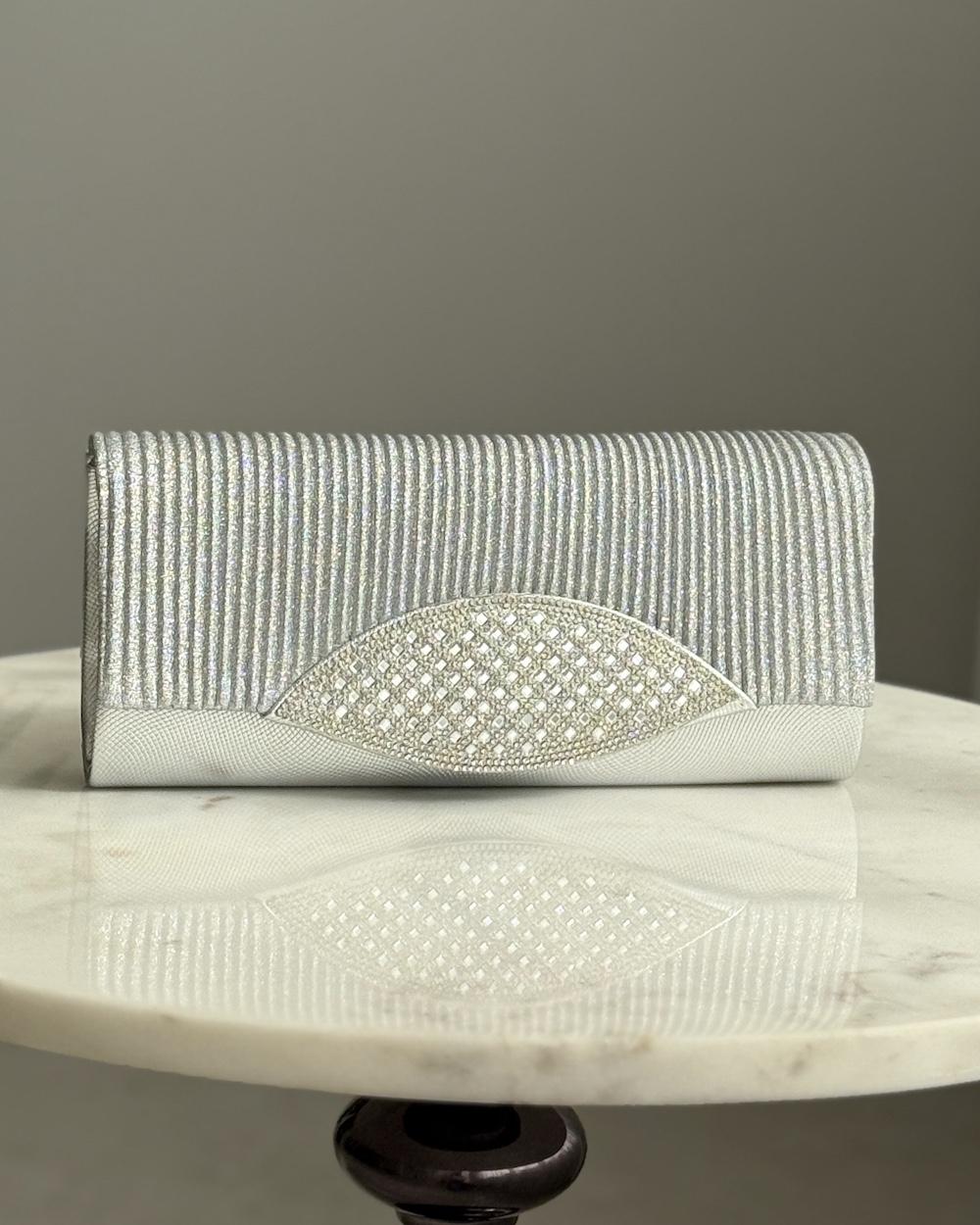 A bag decorated with a front panel made of rhinestones