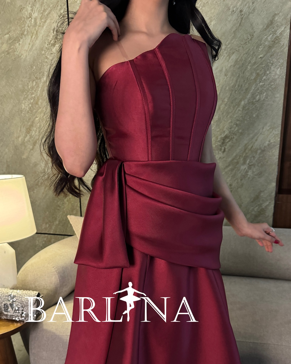 Elegant burgundy evening dress with corset design