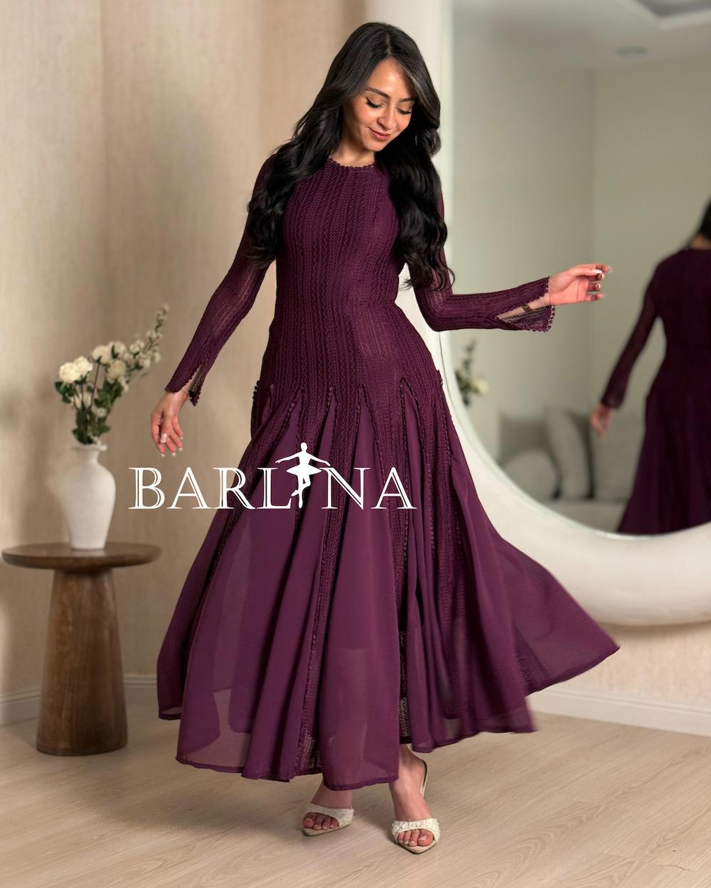 Long-sleeved dress with a wide flared cut