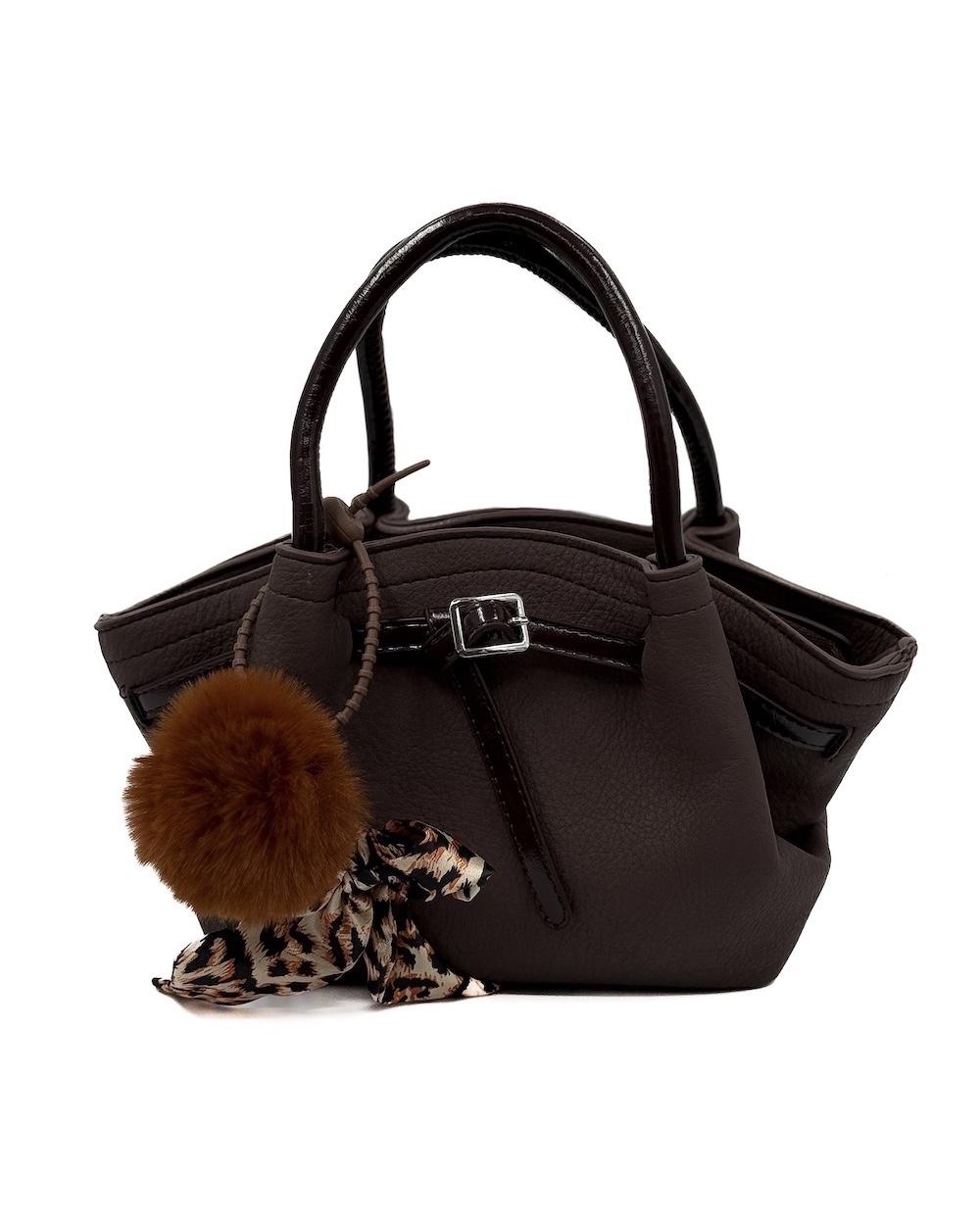 An elegant handbag adorned with a soft fur trim