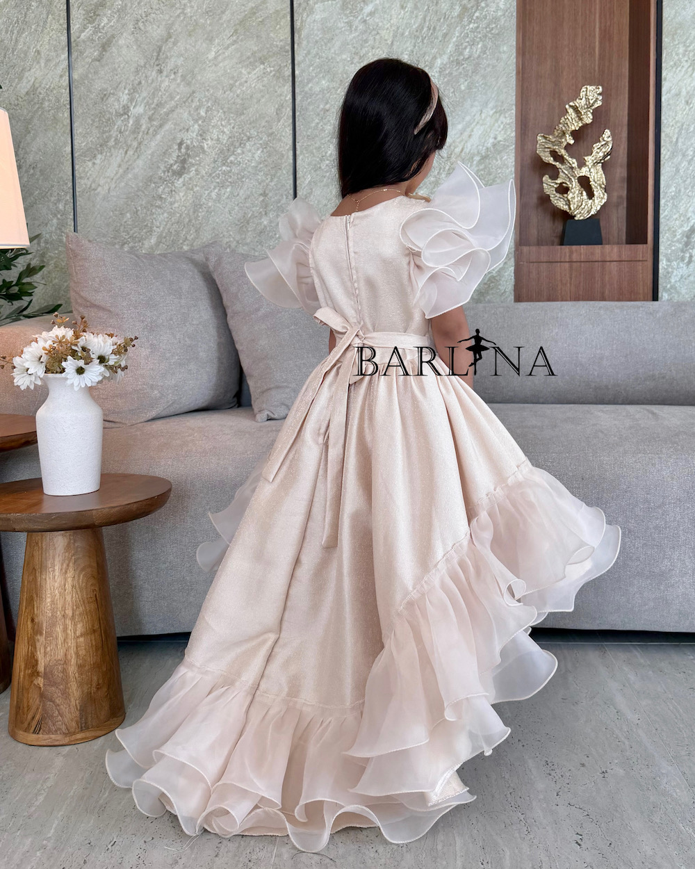 Beige girls dress with fluffy design and prominent flowers