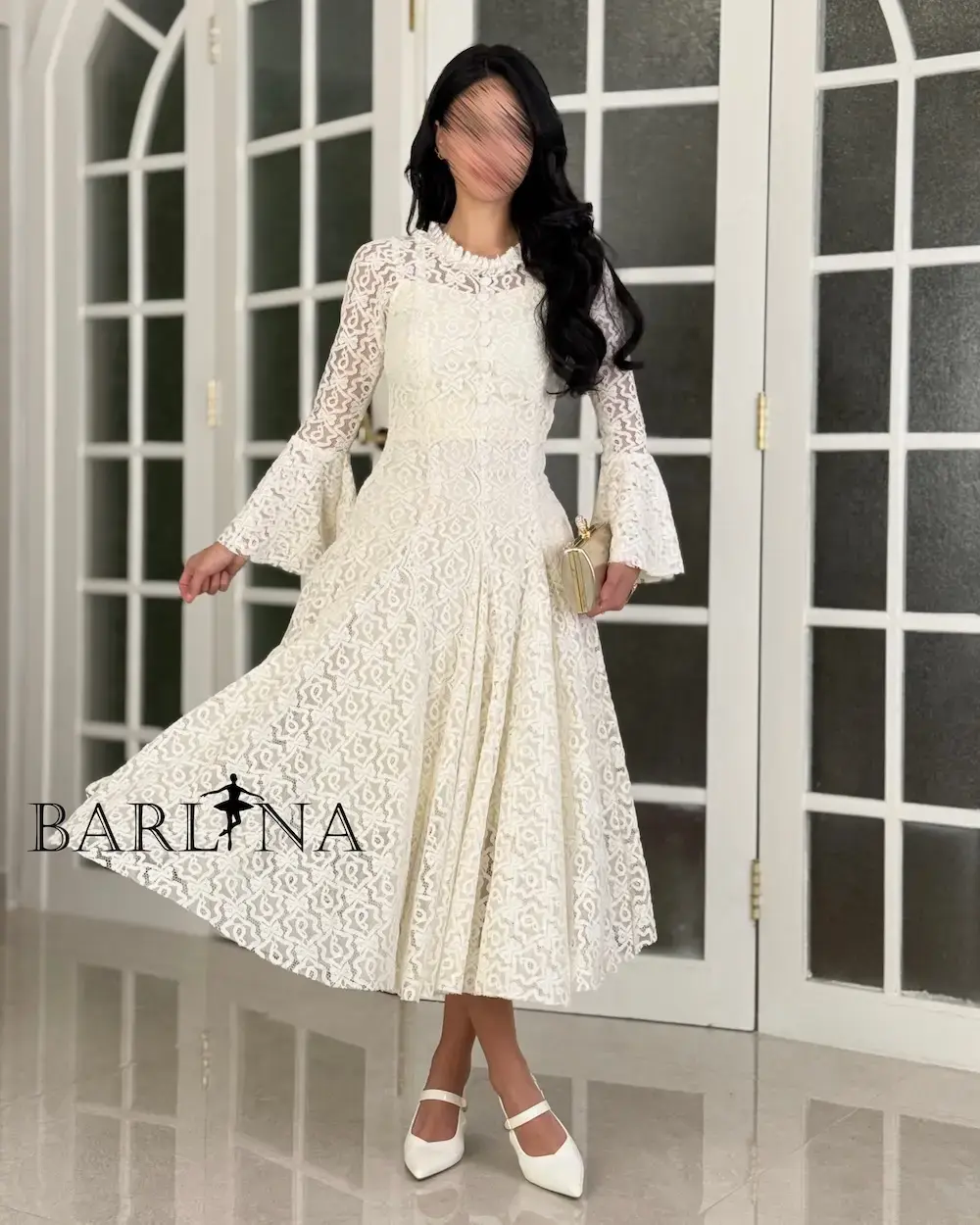 A soft dress adorned with elegant lace patterns