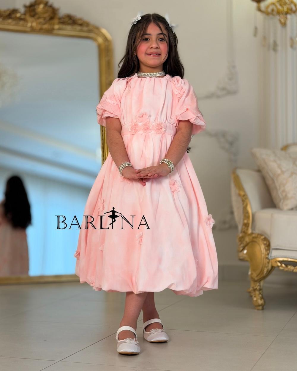 Girls' dress with a belt decorated with flowers