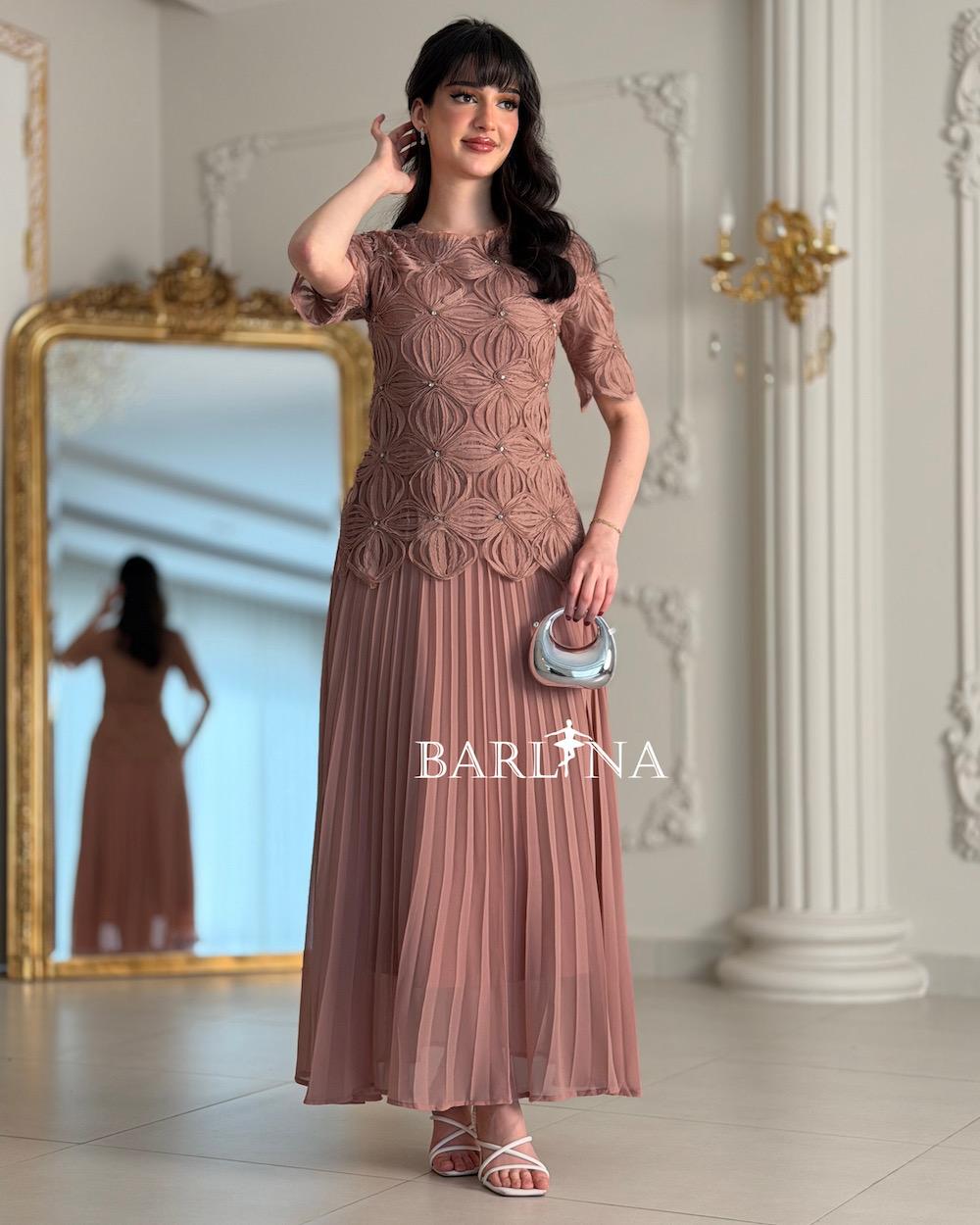 Soft pleated dress with embroidered bodice